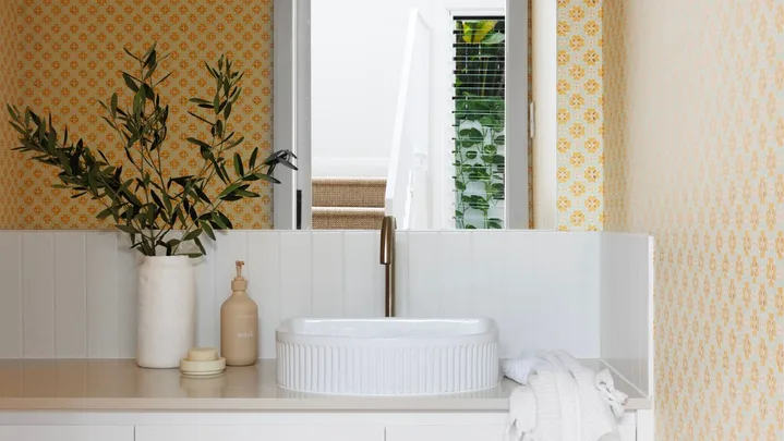 powder room with wallpaper