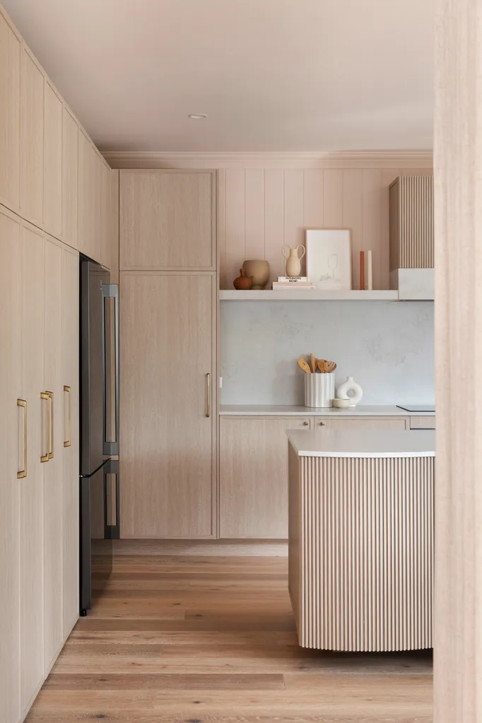 Earthy-toned cottage kitchen renovation by Three Birds