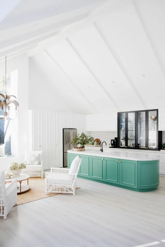 Three Birds Renovations kitchen with curved teal kitchen island bench