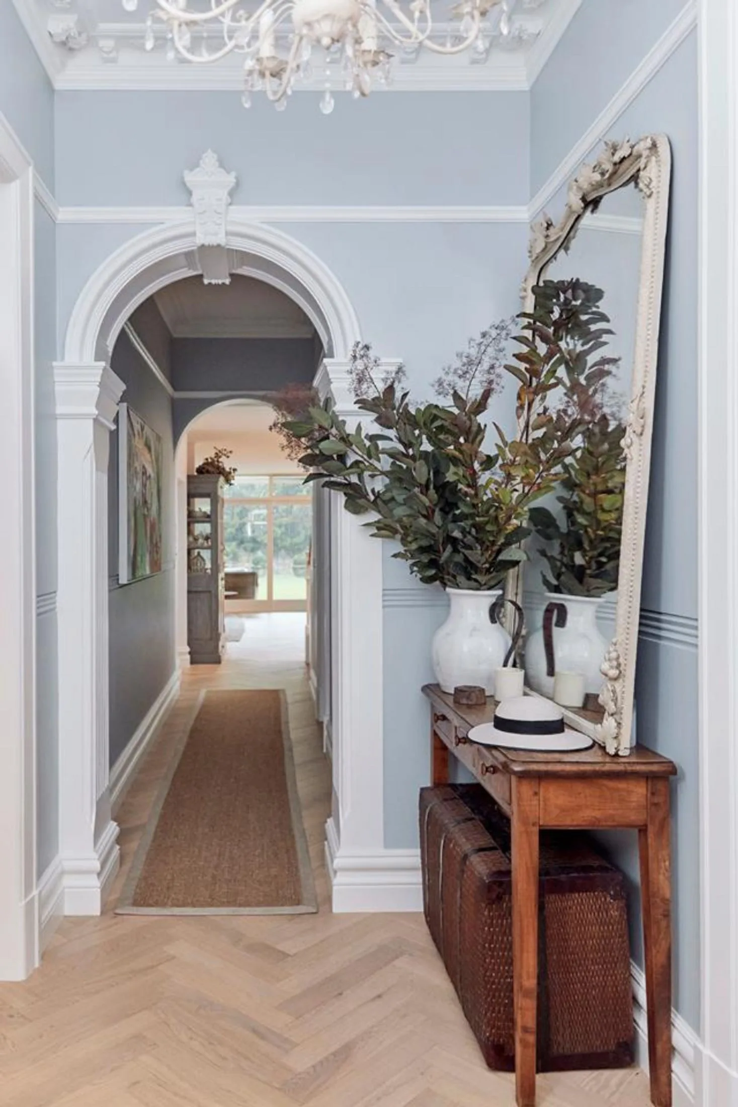 Victorian-style hallway with antique mirror