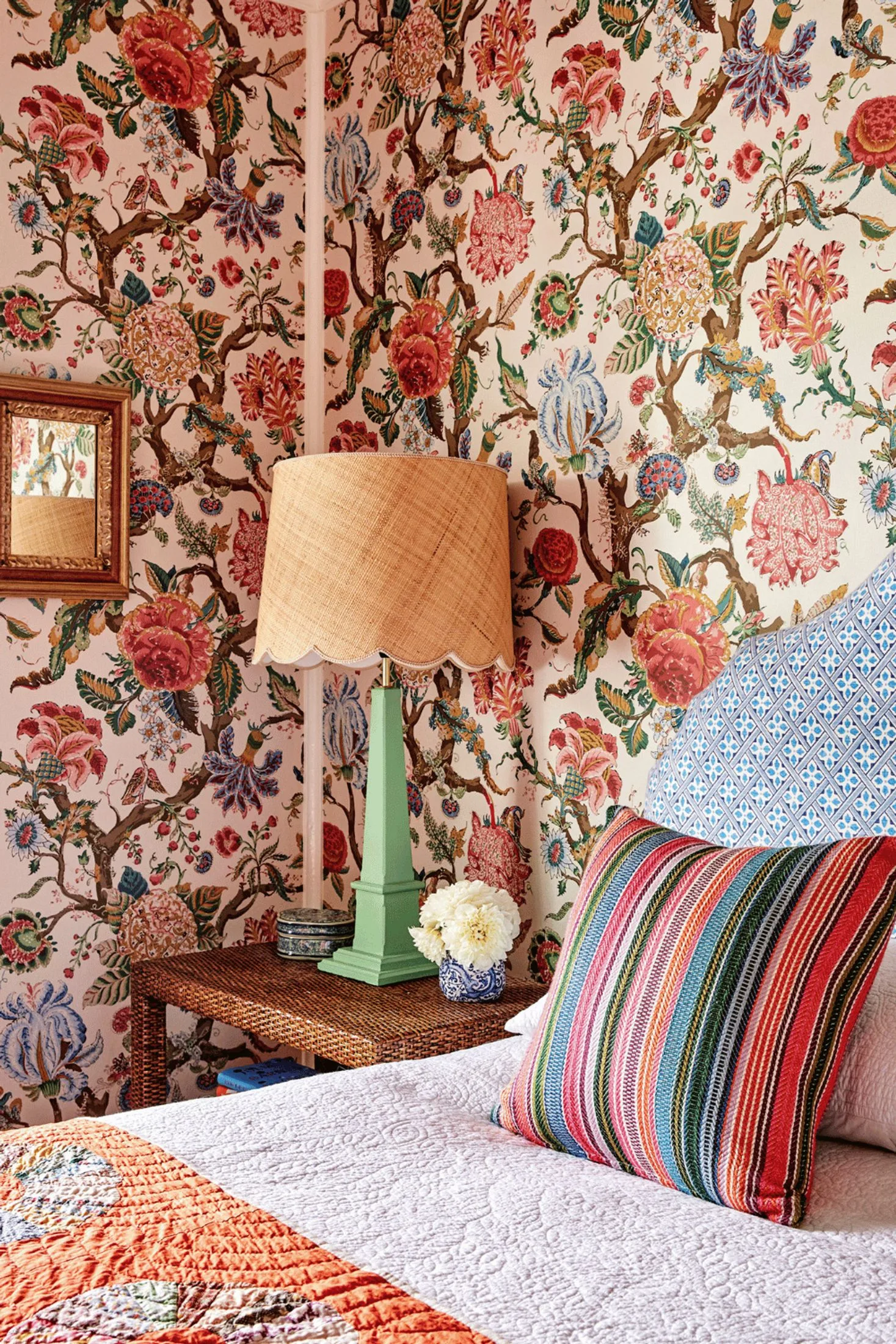 Master bedroom with colourful floral wallpaper