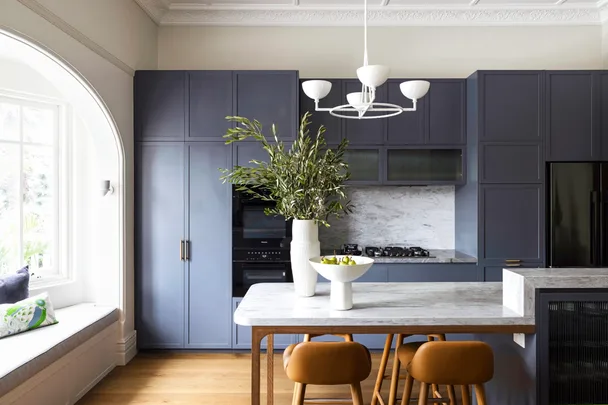 modern kitchen with blue cabinets