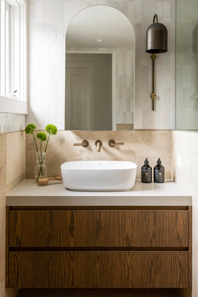 bathroom with wooden cabinetry