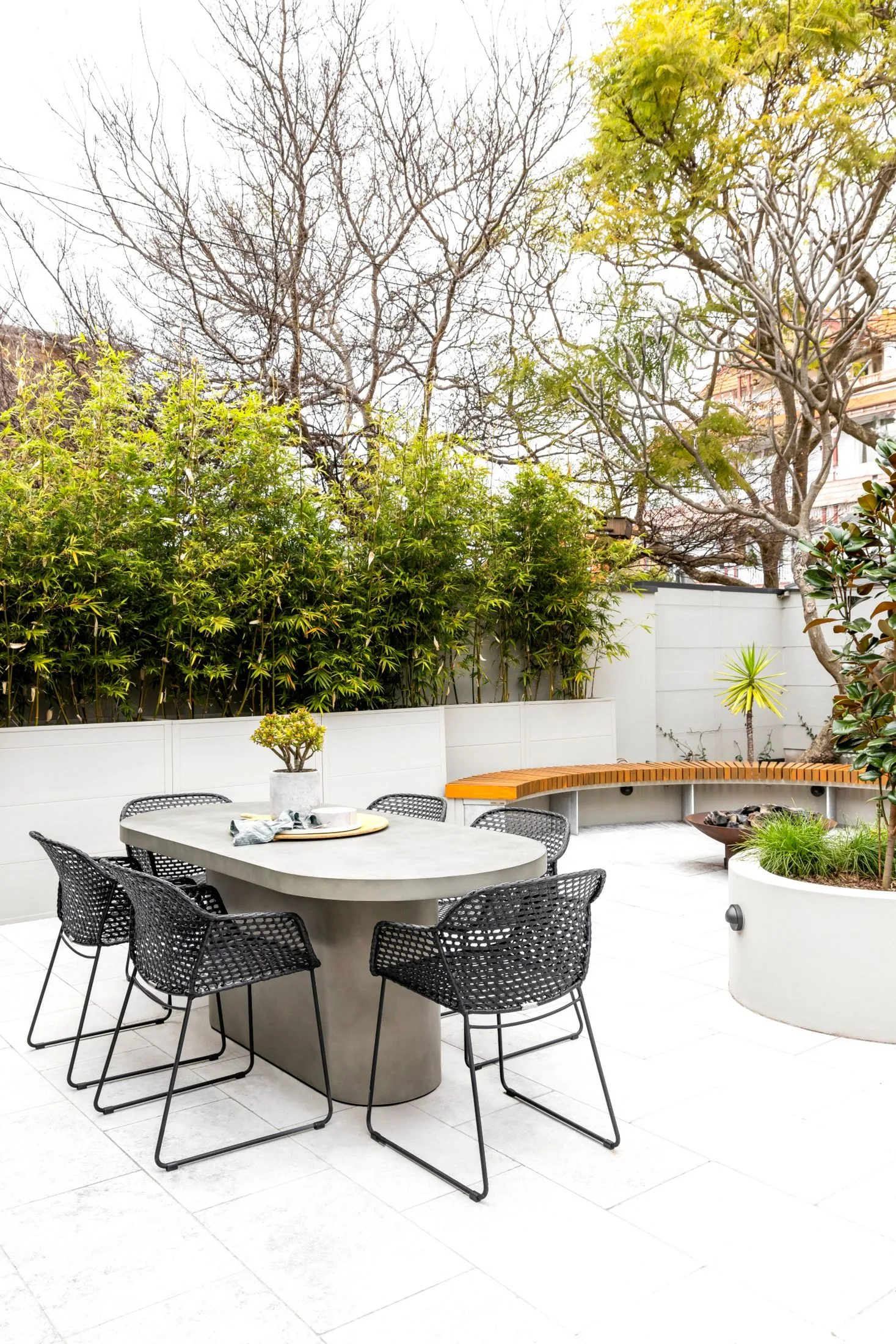 outdoor area with curved bench