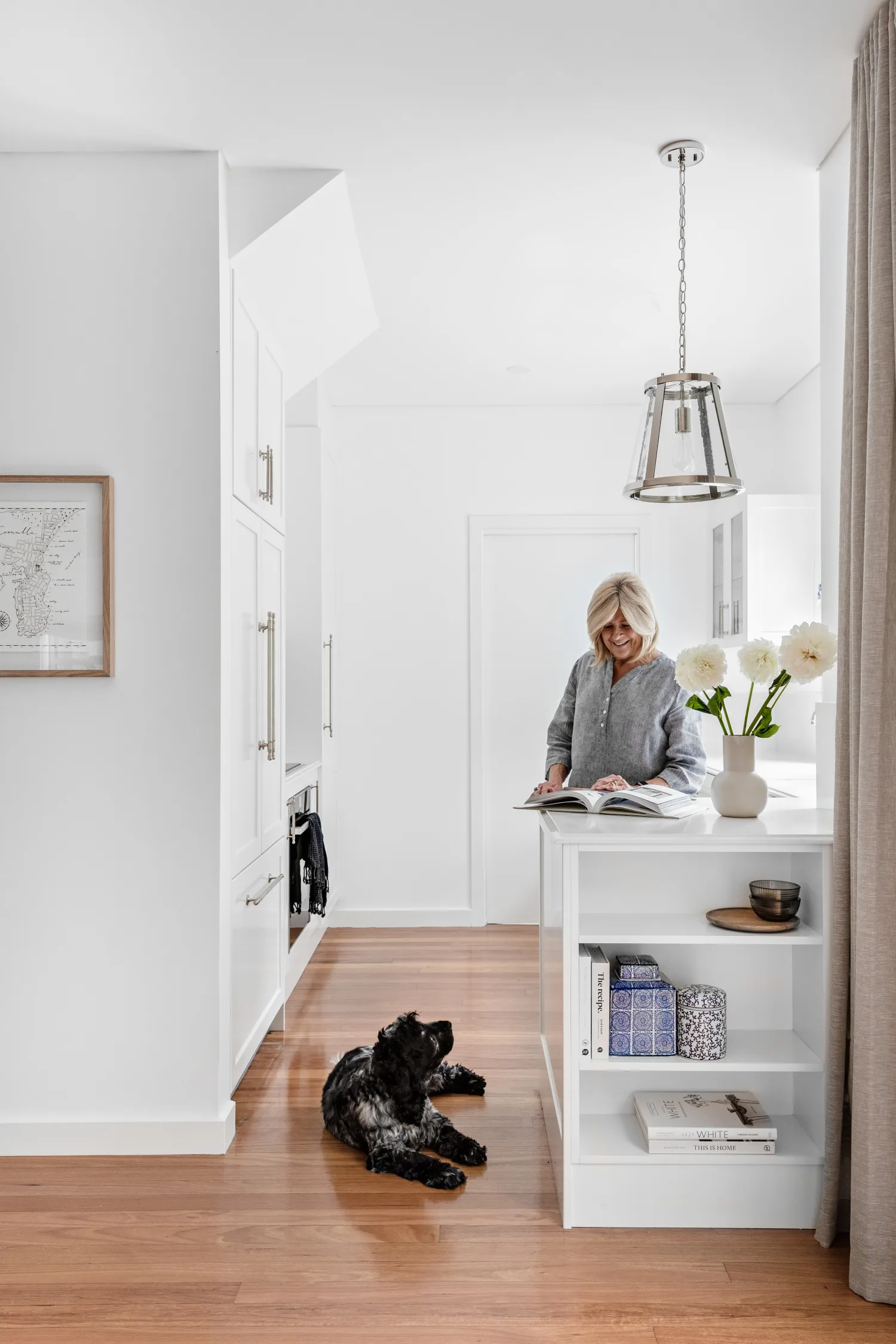 White kitchen with wooden floors