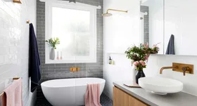 This small family bathroom design packs a pretty punch