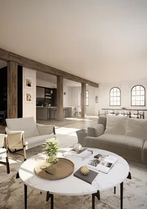 Modern, open living room with neutral tones, featuring large windows, exposed beams, and a round marble coffee table.