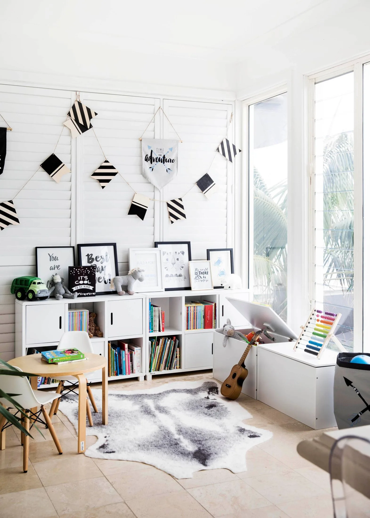 Monochrome themed kids room with fun garland