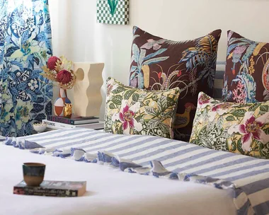 Modern bedroom with a combinatin of striped and floral bedding