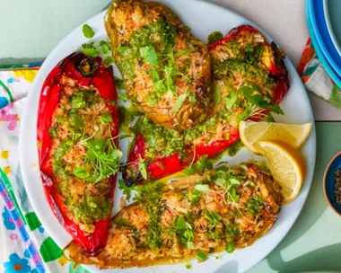 air fried stuffed chili peppers with rice haloumi and herb dressing on top