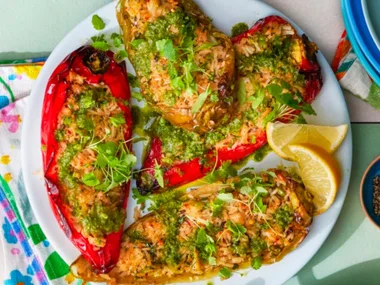 air fried stuffed chili peppers with rice haloumi and herb dressing on top