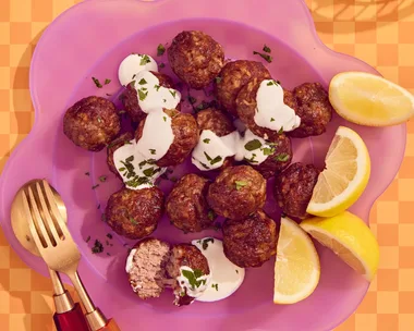 meatballs in air fryer on pink scalloped plate