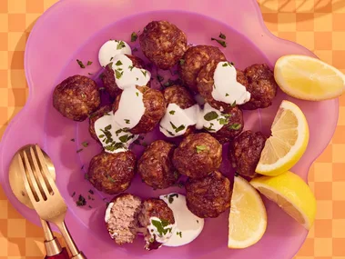 meatballs in air fryer on pink scalloped plate