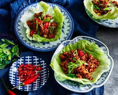 san choy bow in lettuce cups in bowls