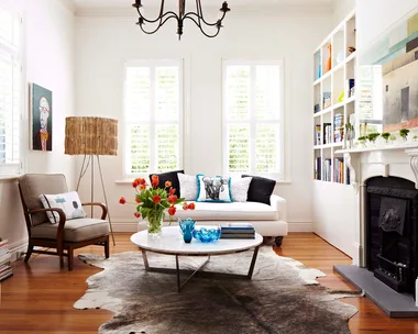 Cosy living room with timber flooring and book shelves