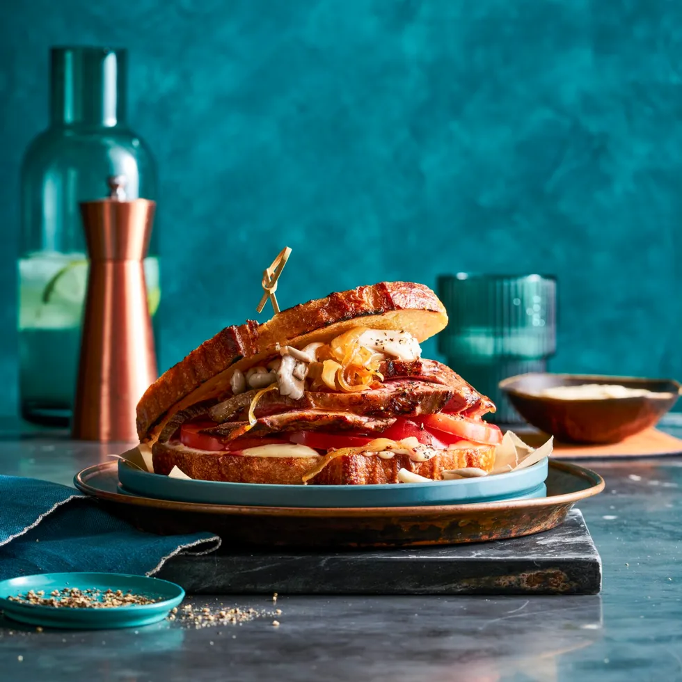 steak sandwich with pickled mushrooms inside