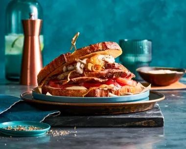 steak sandwich with pickled mushrooms inside