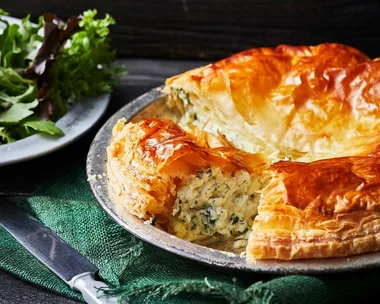 Cheese and herb pie on a dish