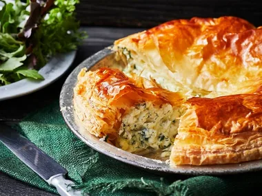 Cheese and herb pie on a dish