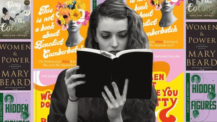 A woman reading a book surrounded by covers of books celebrating women's achievements.