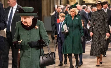 Elderly woman in green coat with cane, alongside people in formal attire at an event.