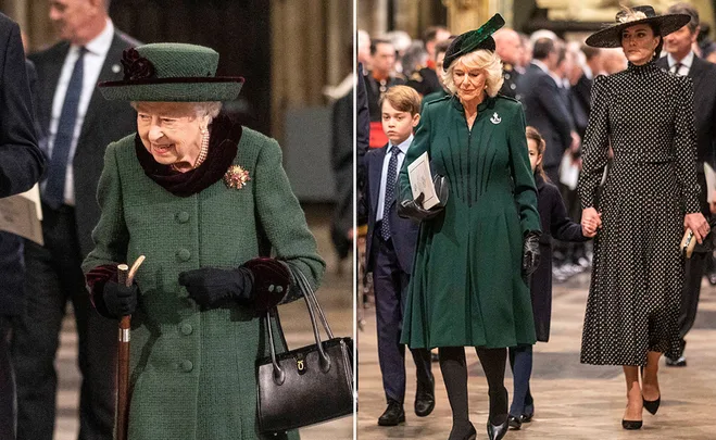 Elderly woman in green coat with cane, alongside people in formal attire at an event.