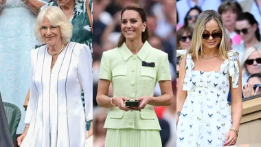 Three women at an event: one in a white dress, one in a light green dress, and one in a butterfly-patterned dress.