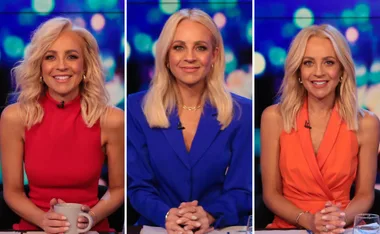 Carrie Bickmore wearing red, blue, and orange outfits on "The Project" with a blurred colorful background.