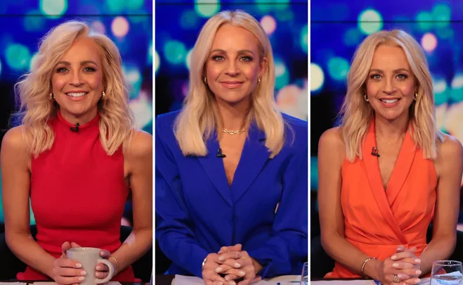 Carrie Bickmore wearing red, blue, and orange outfits on "The Project" with a blurred colorful background.