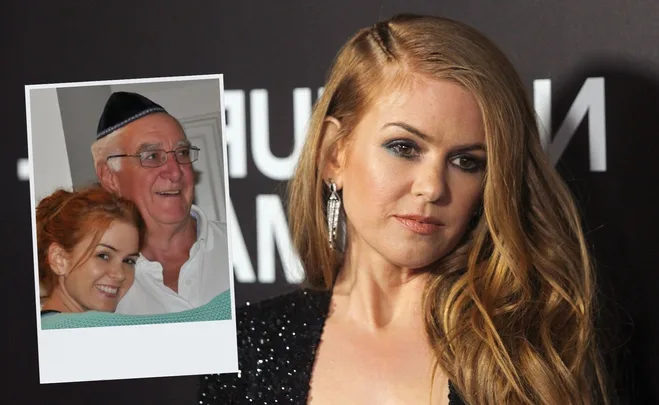 Isla Fisher posing on a red carpet; inset photo shows her smiling with an older man wearing glasses and a yarmulke.