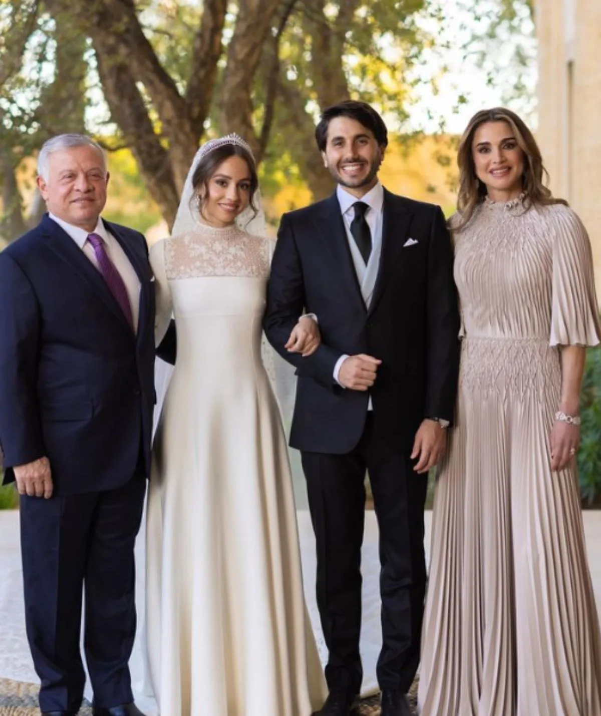 The King and Queen of Jordan with the bride and groom, Princess Iman and Jameel Thermiotis.