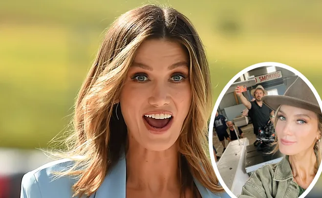 Woman smiling in a blue blazer with inset photo of her taking a selfie on a film set, wearing a hat.