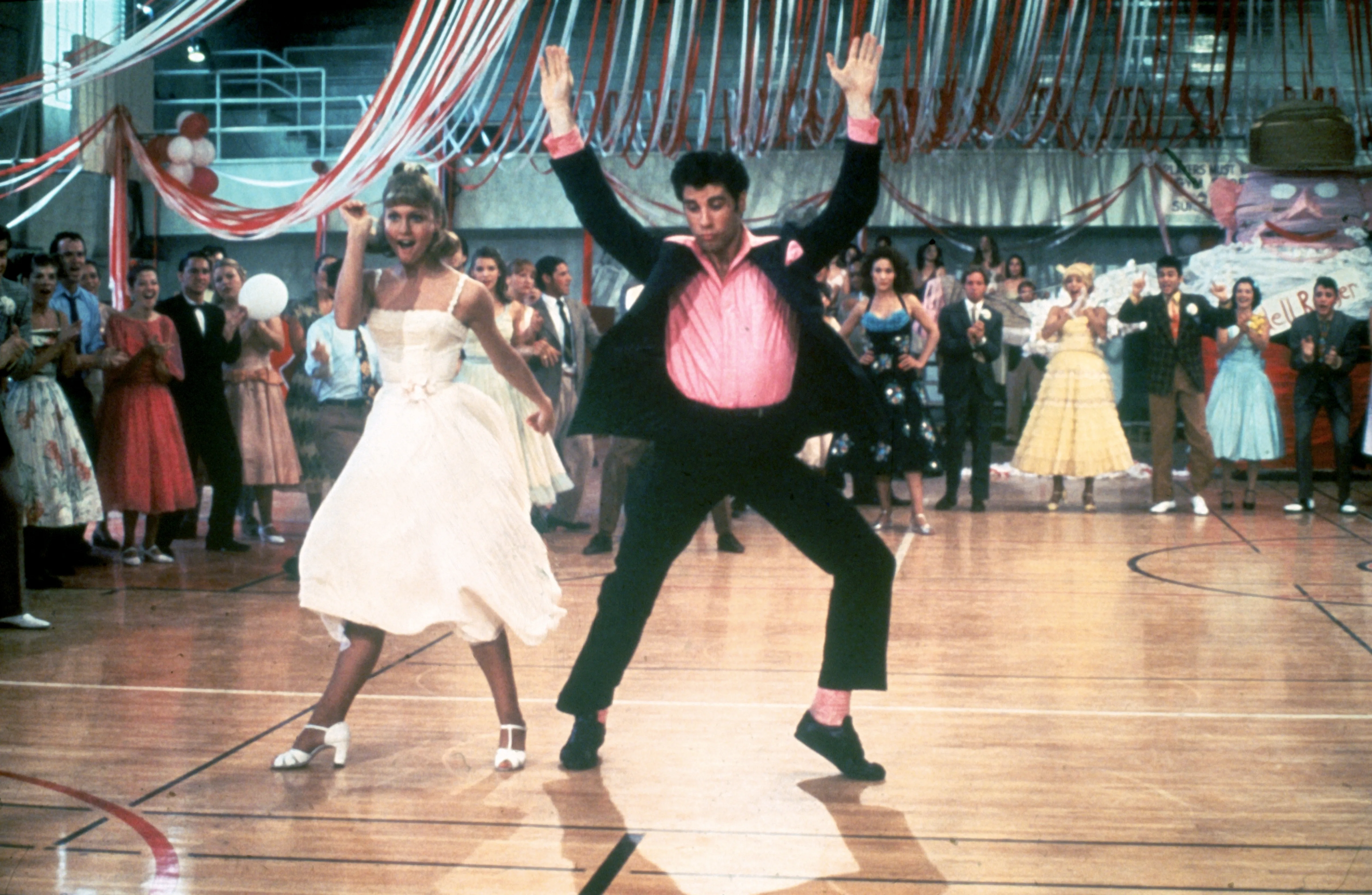 A still of Olivia Newton-John and John Travolta in Grease.