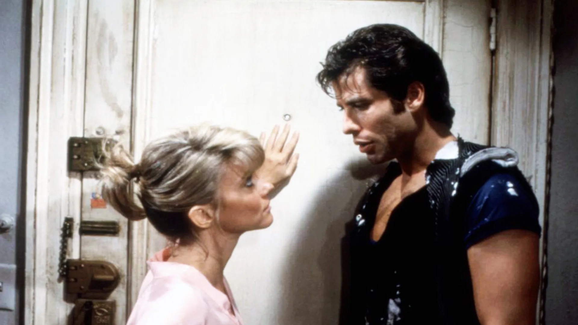 A still of Olivia Newton-John and John Travolta in Two of a Kind.