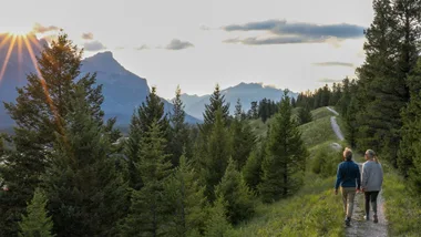Couple walking on nature trail to represent sustainable responsible travel