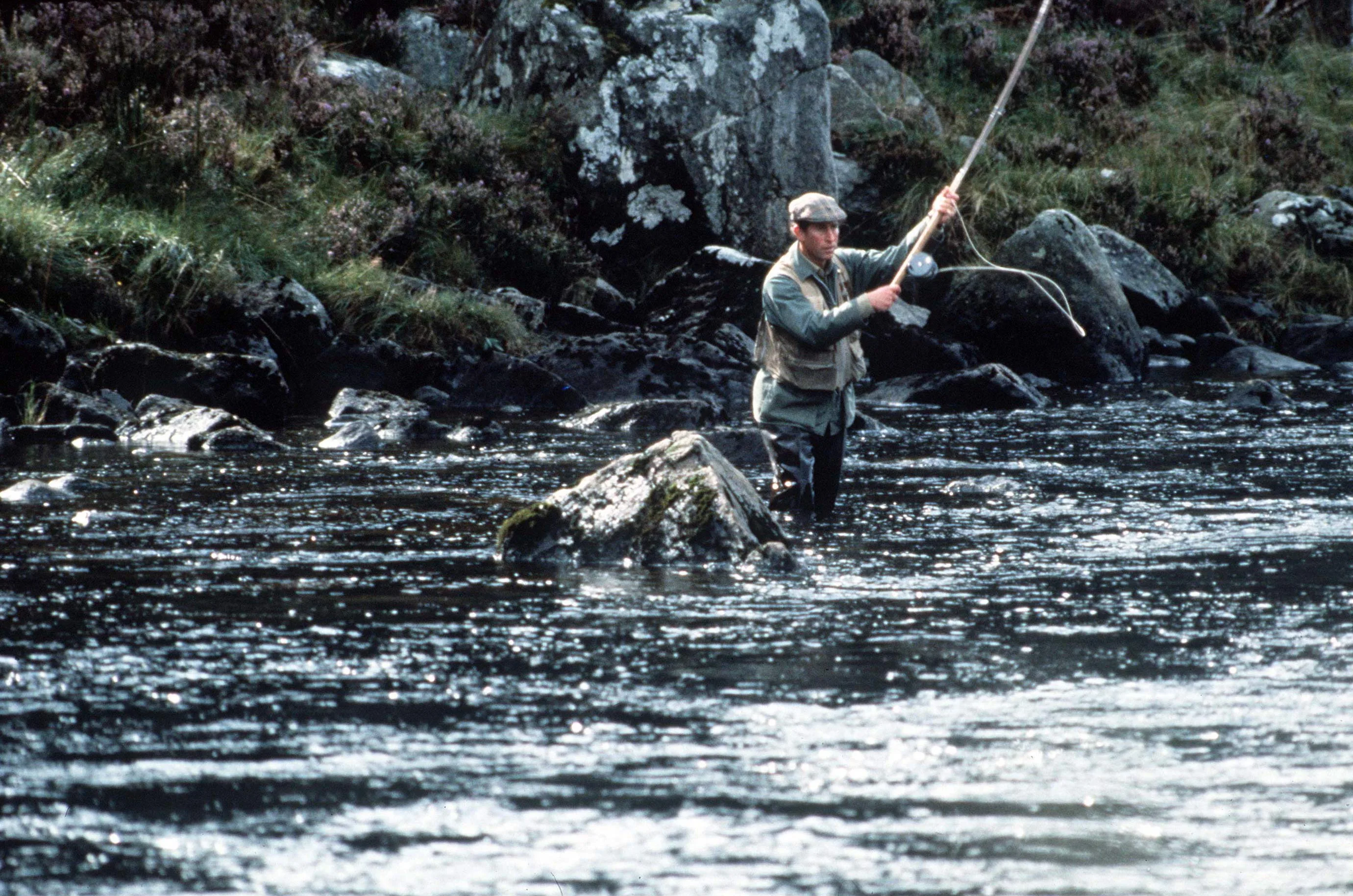 The then-Prince Charles fishing On The River Dee At Balmoral.  (Photo by Tim Graham Photo Library via Getty Images)