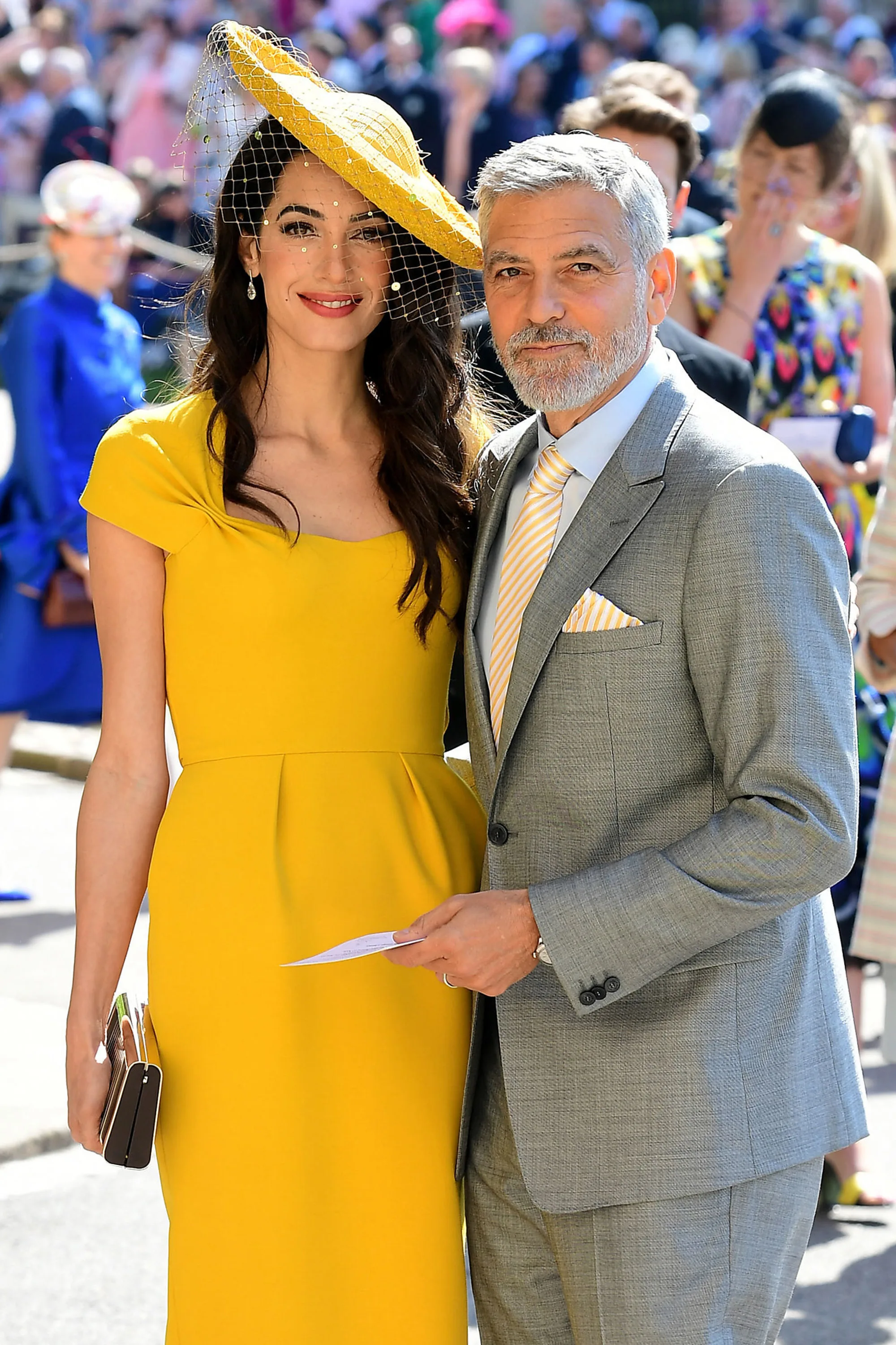 WINDSOR, UNITED KINGDOM - MAY 19: Amal and George Clooney arrive at St George's Chapel at Windsor Castle before the wedding of Prince Harry to Meghan Markle on May 19, 2018 in Windsor, England. (Photo by Ian West - WPA Pool/Getty Images)