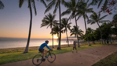 Bike rider on The Stand promenade in Townsville, Queensland.