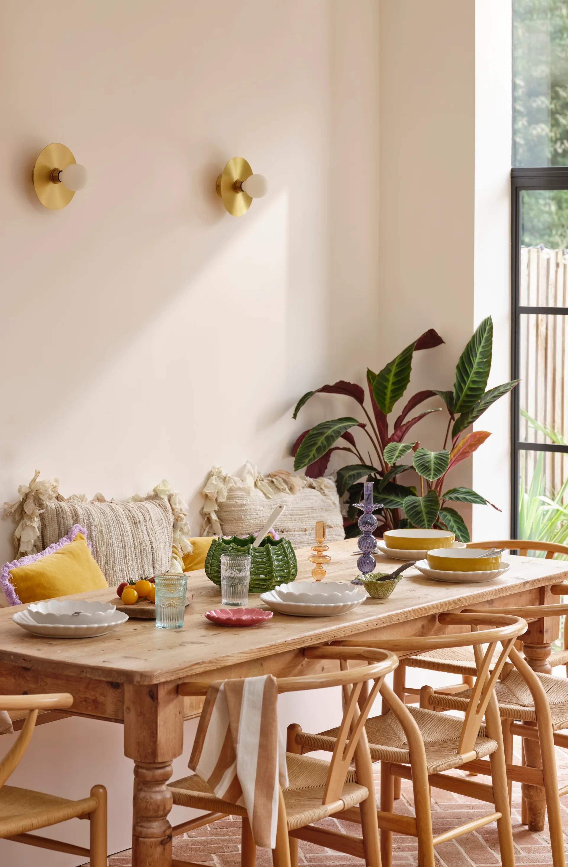Dining room setting with a light wooden table