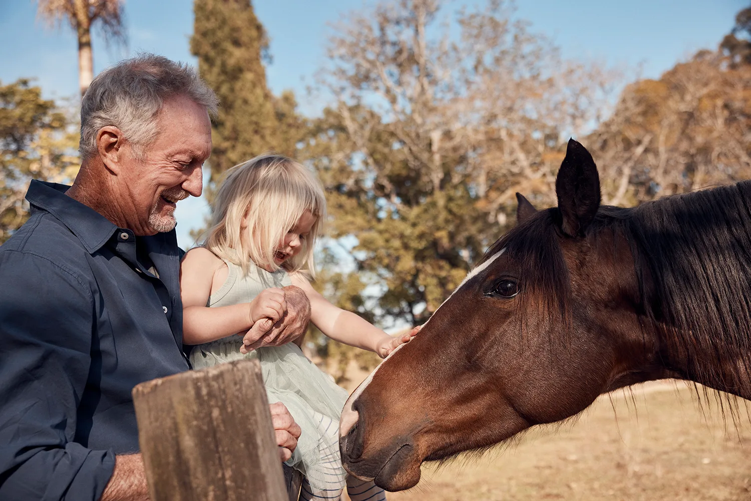 Bryan Brown with grandaughter and horse at their farm