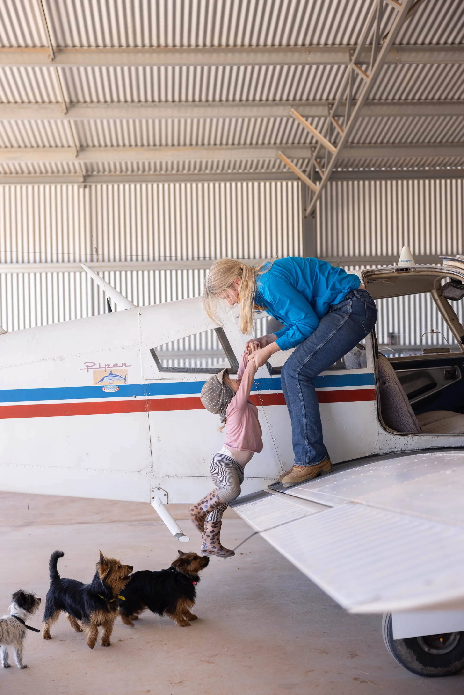 Vet Ameliah Scott with daughter Lindsay and their dogs.