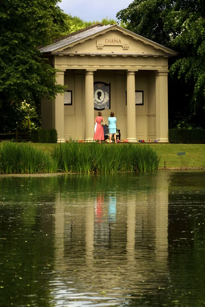 391235 12: Visitors look at the Diana Shrine June 28, 2001 on Oval Lake as Althorp Estate is re-opened to the public in Great Brington, outside London, UK. (Photo by Sion Touhig/Getty Images)