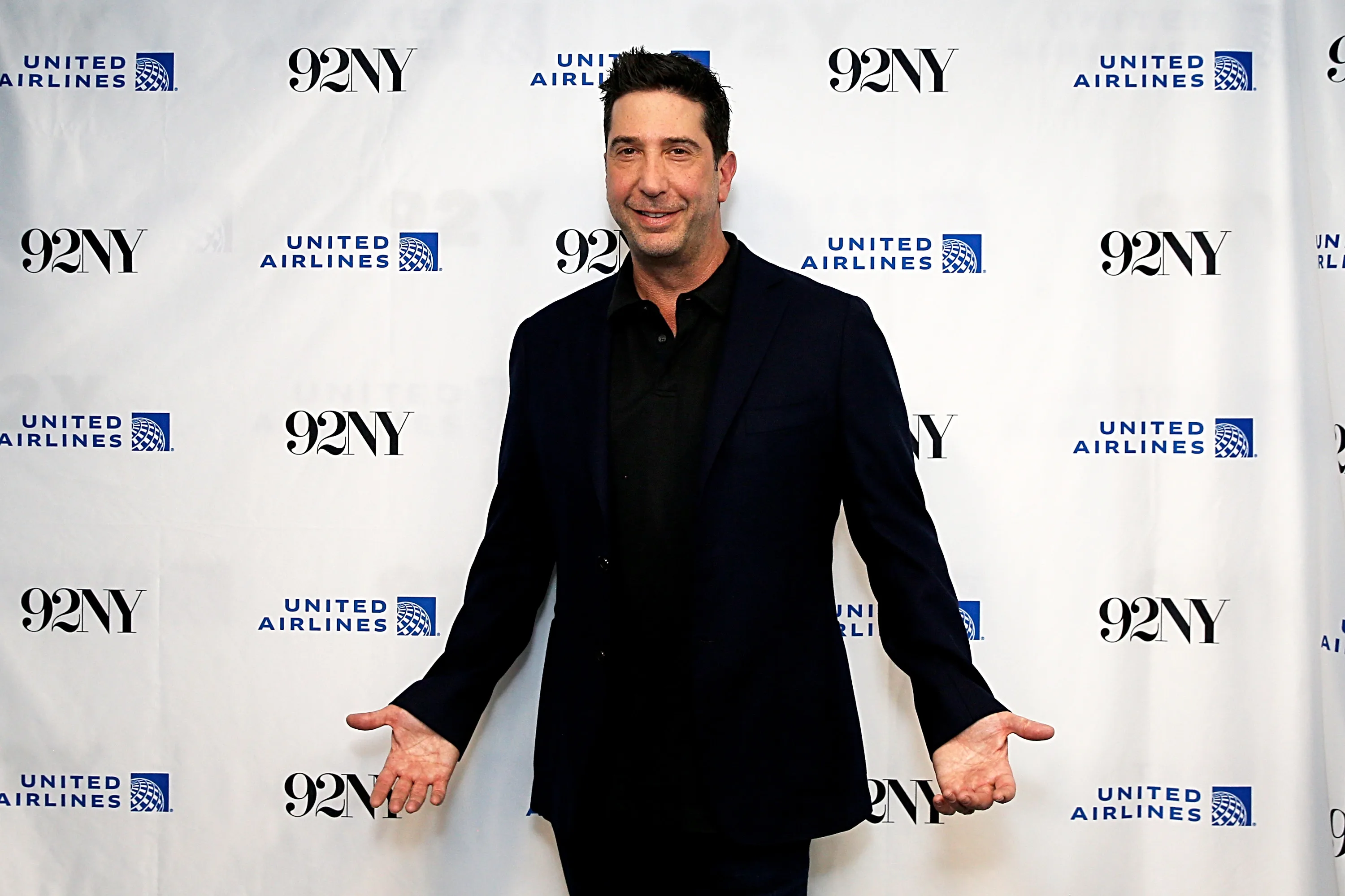 David Schwimmer wears a black suit on the red carpet for conversation with James Burrows at The 92nd Street Y, New York