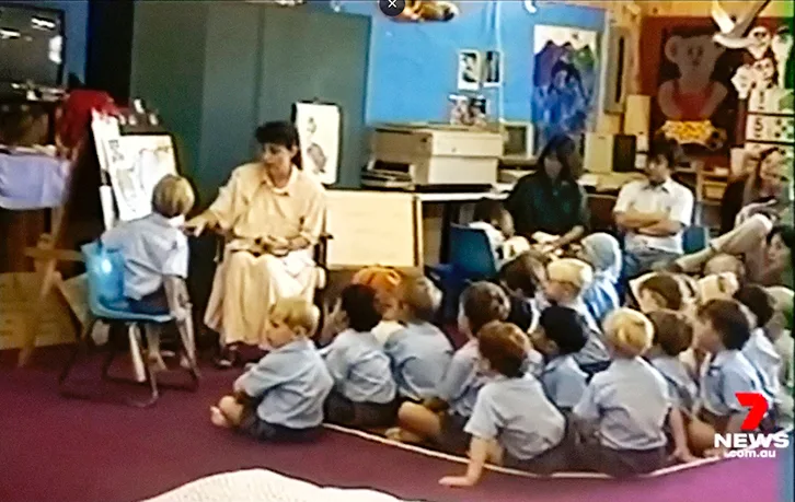 A woman, Marion Barter, teaching a class.