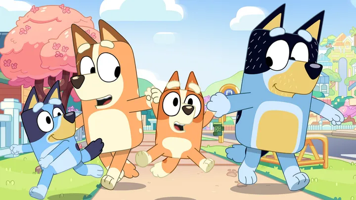 Animated family of dogs happily walking in a colorful neighborhood, featuring blue and orange characters.