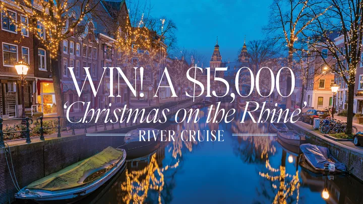 Canal view decorated with holiday lights at dusk, promoting a $15,000 "Christmas on the Rhine" river cruise competition.