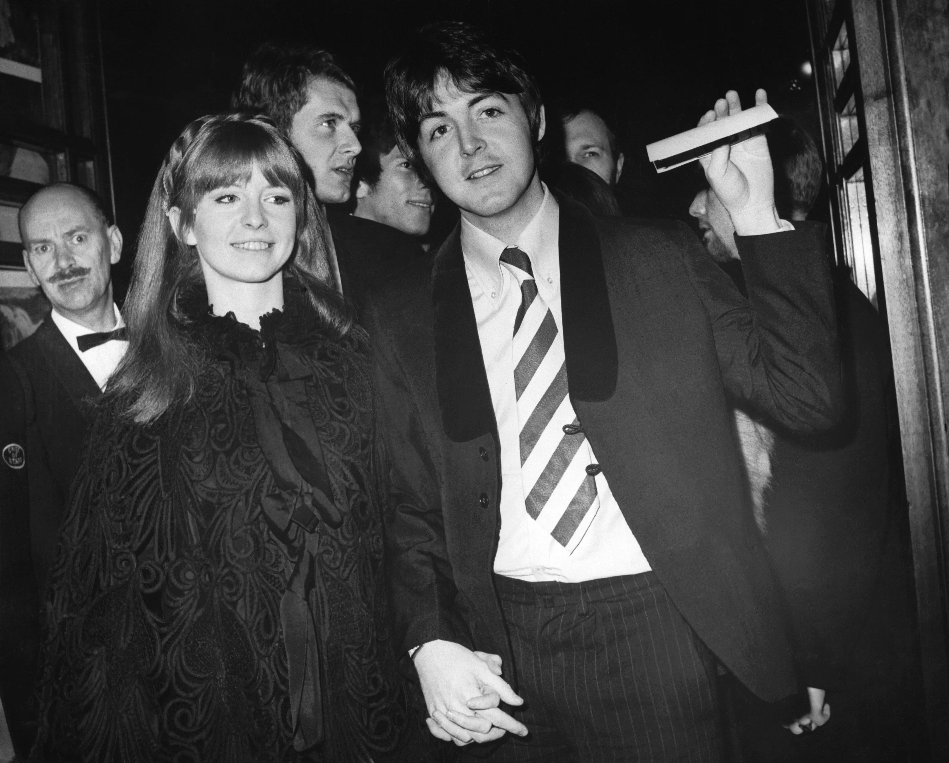 (Original Caption) 1/4/1968-London, England- Beatle Paul McCartney, and actress-girlfriend Jane Asher, arriving at the London Pavillion for the world premiere of "Here We Go 'Round the Mulberry Bush."