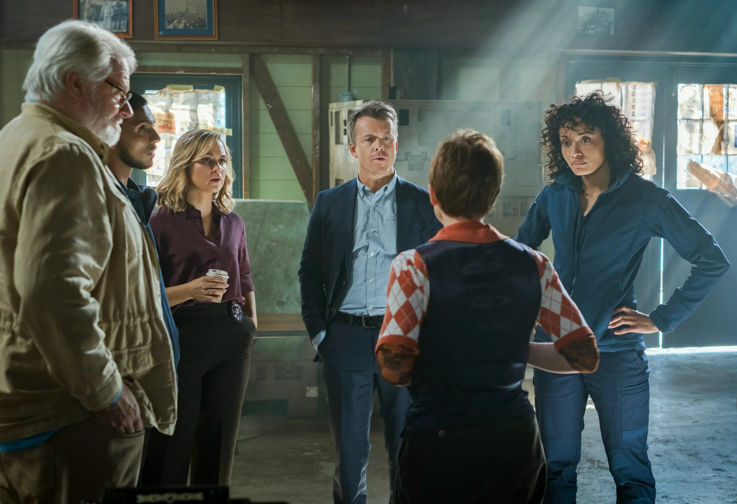 L-R: William McInnes as Forensic Pathologist Dr. Roy Penrose, Sean Sagar as Special Agent DeShawn Jackson, Tuuli Narkle as AFP Liaison Officer Constable Evie Cooper, Todd Lasance as AFP Liaison Officer Sergeant Jim  'JD' Dempsey, Olivia Swann as NCIS Special Agent Captain Michelle Mackey and Mavournee Hazel as Forensic Pathologist “Bluebird 'Blue' Gleeson in NCIS: Sydney season 1, episode 1.  PHOTO CREDIT: Daniel Asher Smith/Paramount+    © TM & © 2023 CBS Studios Inc. NCIS: Sydney and related marks and logos are trademarks of CBS Studios Inc. All Rights Reserved.