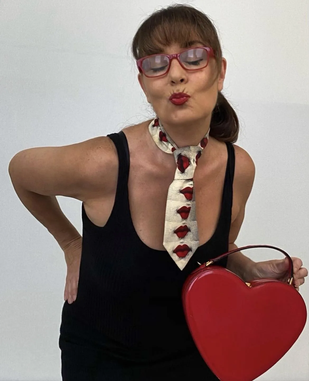 The Nanny fashion Moschino red heart bag