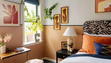 A bedroom with bright colours